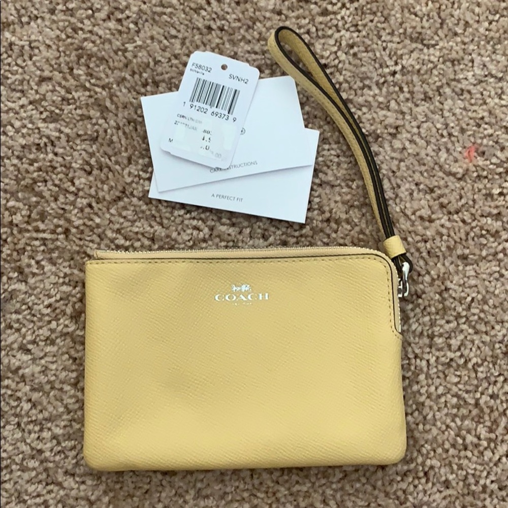 SOLD brand new never used coach wristlet - Picture 1 of 3